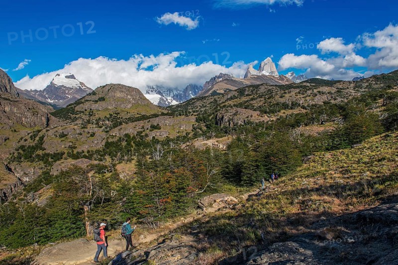 Trekkers at Cascada Martin with a view of the Fitzroy Massif, El Chaltén, Los Glaciares National Park, Santa Cruz, Patagonia, Argentina, South America