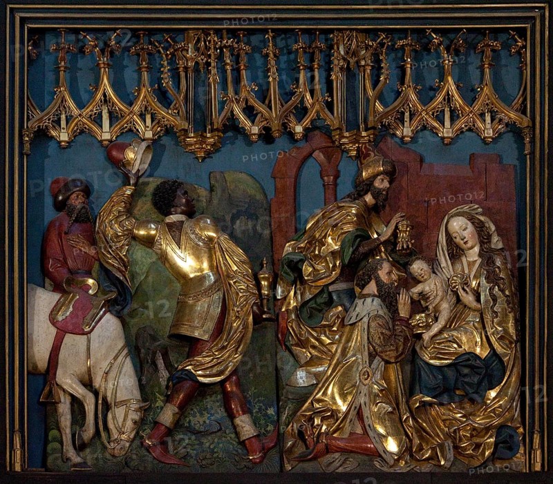 Main altar by Veit Stoß 1477-1489, lower left wing: Adoration of the Magi, St., Saint, Saint