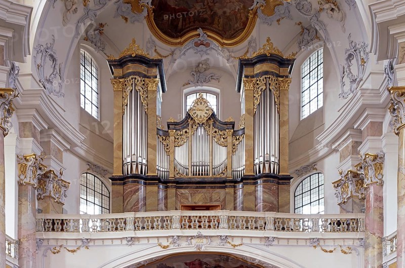View to the east with the altar of grace and main organ. The Vierzehnheiligen Basilica near Bad Staffelstein in the district of Lichtenfels is a pilgrimage church in Upper Franconia. The church, built according to plans by Balthasar Neumann, is dedicated to the Fourteen Holy Helpers and receives around half a million visitors a year