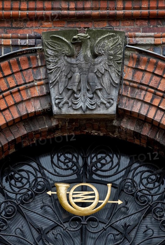 The battle for the Polish post office in Danzig was one of the first battles in the Polish campaign at the beginning of the Second World War, main entrance, detail of the national coat of arms and today's postmark