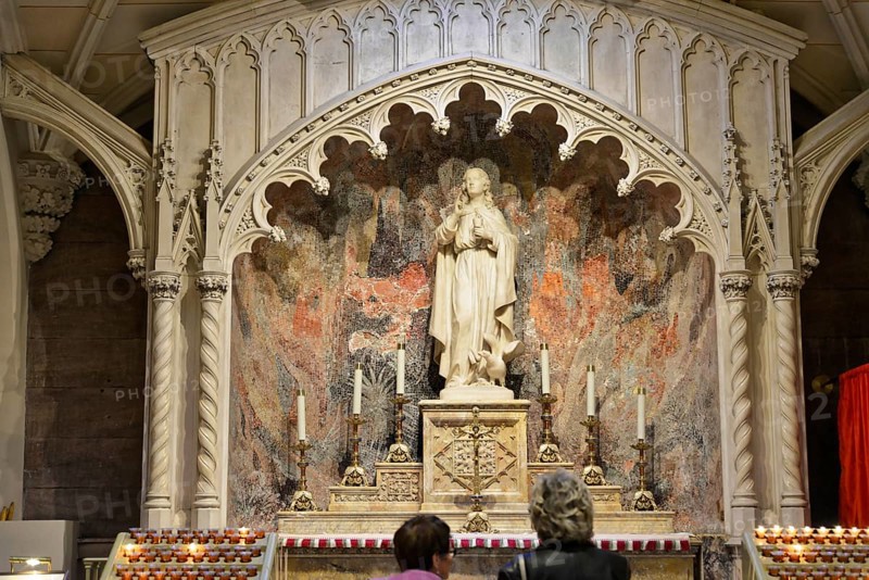 Saint Patricks Old Cathedral or Old St. Patricks, Lower Manhattan, Imposing church altar with a marble sculpture and candles in a sacred space, Manhattan, New York City, New York, USA, North America