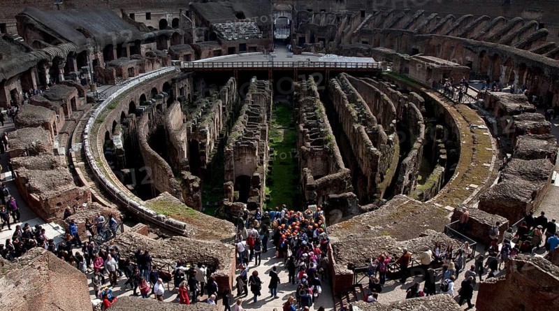 Interior with wall remains below the former arena
