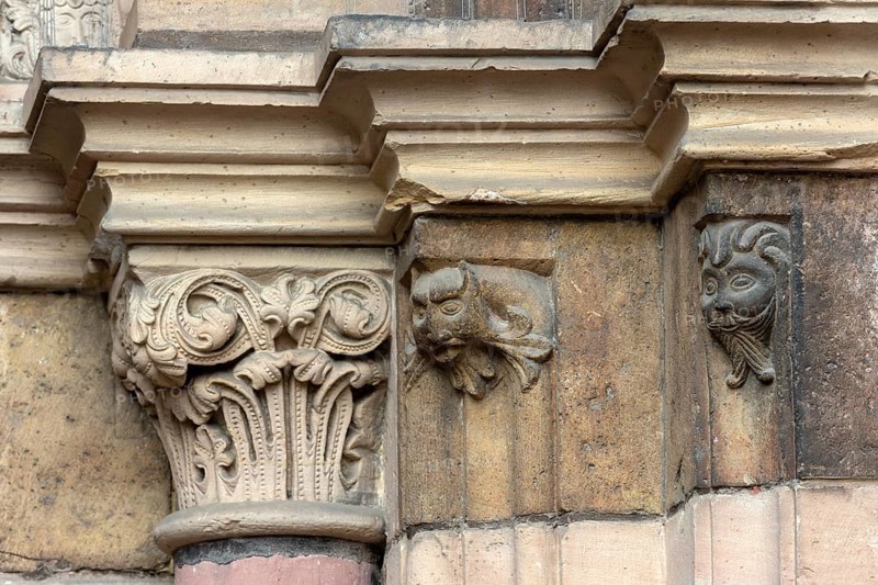 Mainz, St Martin's Cathedral, north side, market portal, detail of mask, bearded man, fantasy creature and capital