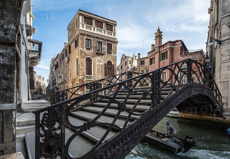 Italy Venice Cannaregio district -281 Head building between two canals on the left Rio di San Giovanni in front Cast iron bridge in the course of Calle di Pinelli