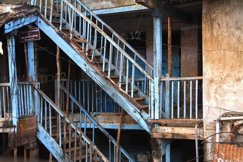Old wooden staircase of jamshetji tadiwala chawl, Mahadev Palav Marg, Curry Road, Bombay Mumbai