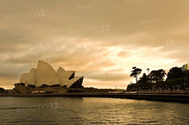 Sydney Opera Theatre at late evening with dramatic sky, Sydney, New South Wales, Australia, Oceania