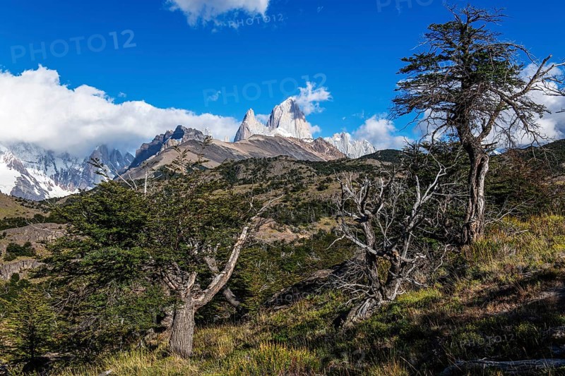 Trekkers at Cascada Martin with a view of the Fitzroy Massif, El Chaltén, Los Glaciares National Park, Santa Cruz, Patagonia, Argentina, South America