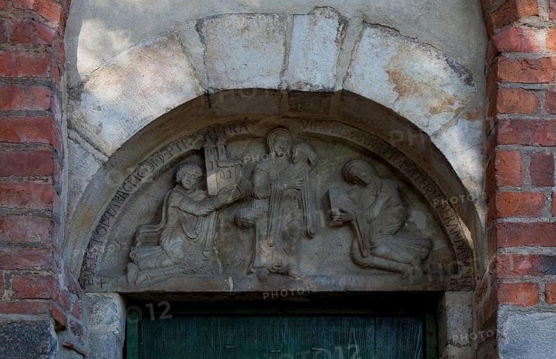 Foundation tympanum, St Anne carrying Mary, on the left son Krystyn of the founder Piotr Wszeborowicz with church model, on the right woman, St, Saint, Saint
