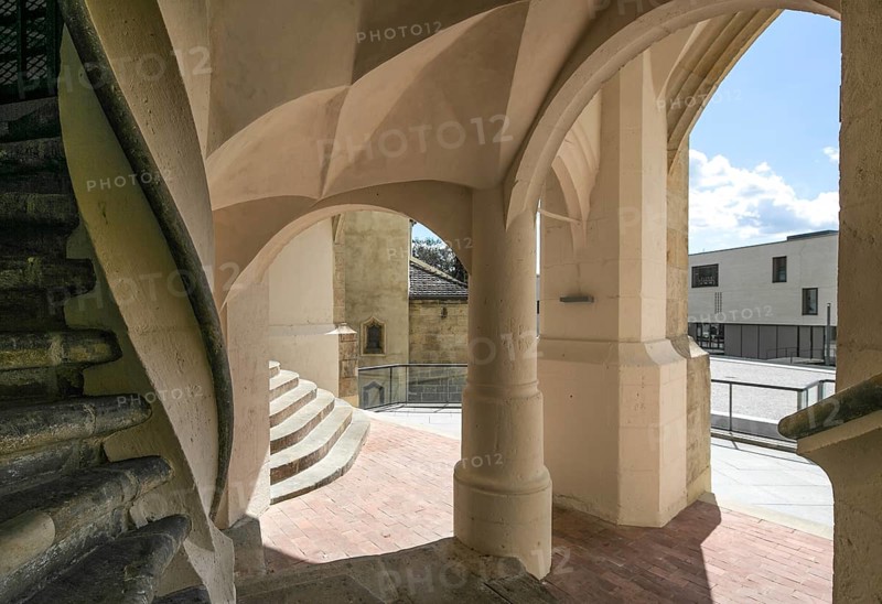 Luther city Wittenberg Castle 6201 open staircase from the 1490s in the north-west corner of the courtyard vestibule in the basement far left spiral staircase view to the outside