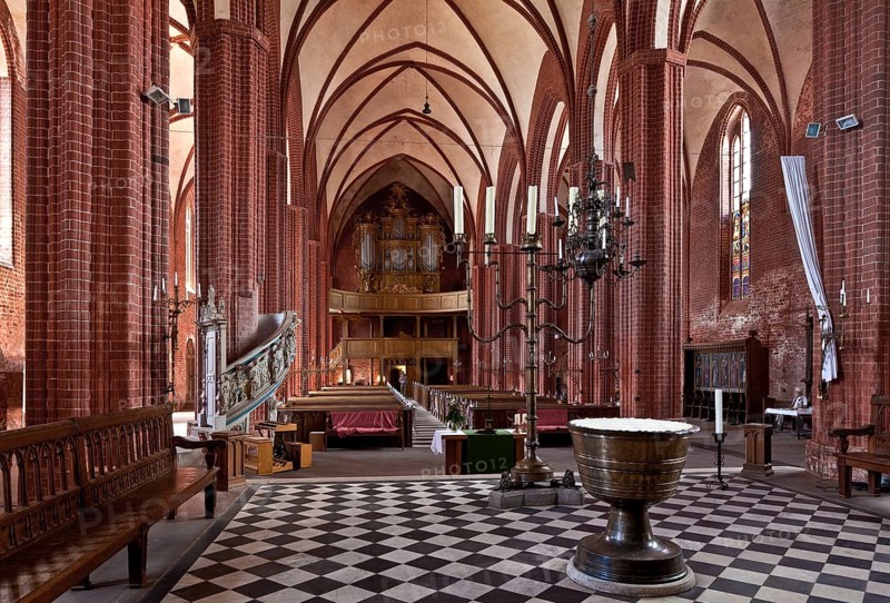 Werben Altmark Stadtkirche St Johannis 87740 Interior facing west 1412-67 built Standing chandelier and baptismal font 1487+89 by Hermen Bonstede Pulpit 1602 by Michael Spies