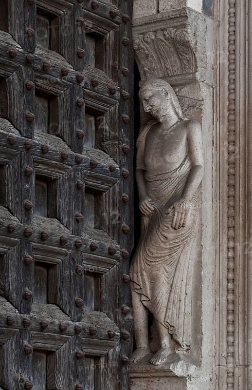 Italy Lodi 89769 Cathedral S Bassiano West portal right vault Sculpture of Adam around 1185