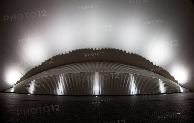 City of Arts and Sciences (cat./val. Ciutat de les Arts i de les Ciències), cinema L'Hemisfèric (el Hemisférico en castellano), architectural detail in nocturnal illuminatiom