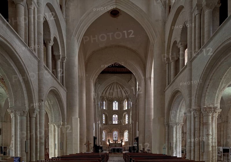 Cerisy-la-Forêt, Normandy, abbey church Interior facing east with a three-zone wall structure, 14th century star vault in the apse and subsequently reinforced crossing pillars