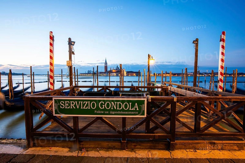 Morning atmosphere in front of sunrise, gondolas, Servizio Gondola, church of San Giorgio Maggiore in the background, Venice, Veneto, Italy, Europe