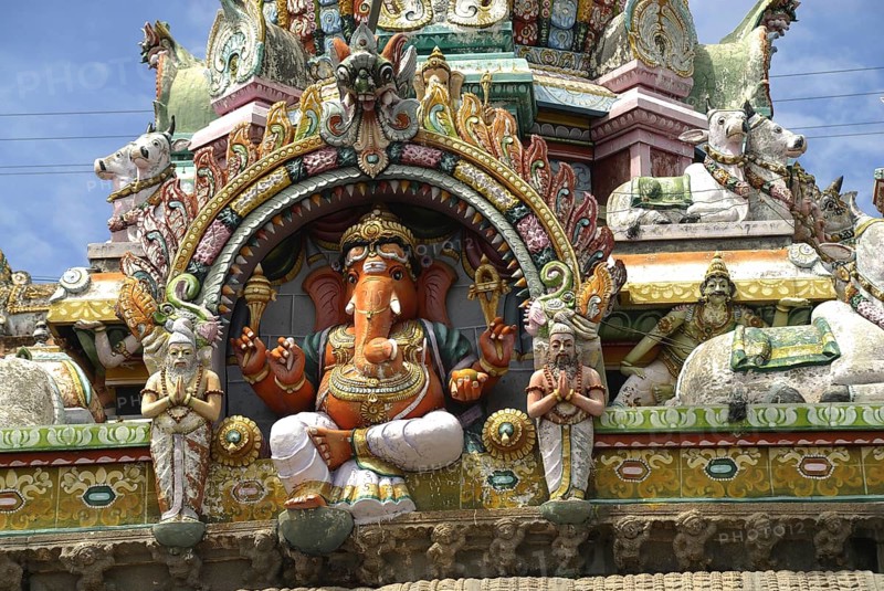 Shiva temple dedicated to Tejo Lingam, idol of Ganesh outside of Garba Griha sanctum sanctorum, Arunachala temple