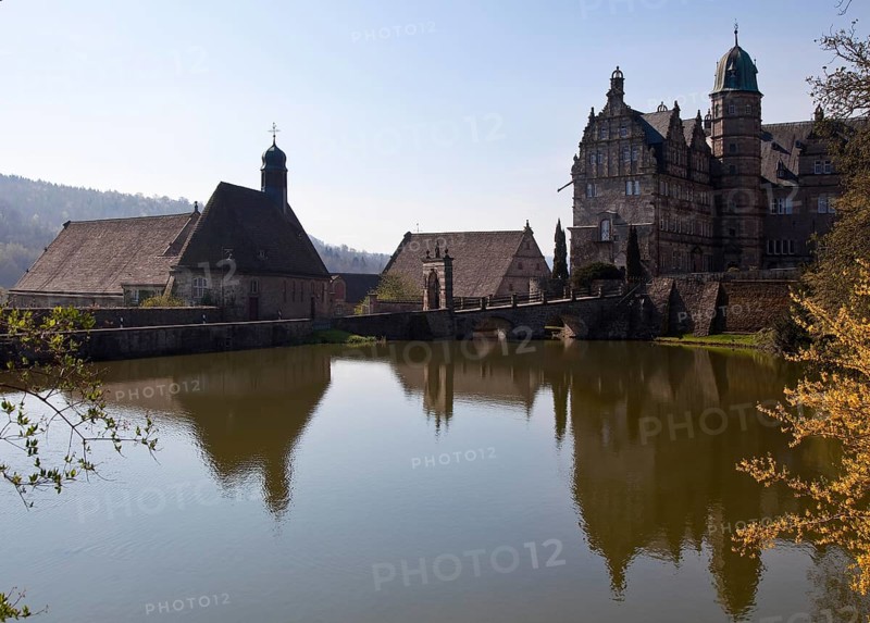 Hämelschenburg b Hameln Castle of the Klencke family 75134 left Castle church 1563 centre Barn in front Bridge gate 1613 right South and west wing of the castle 1590s
