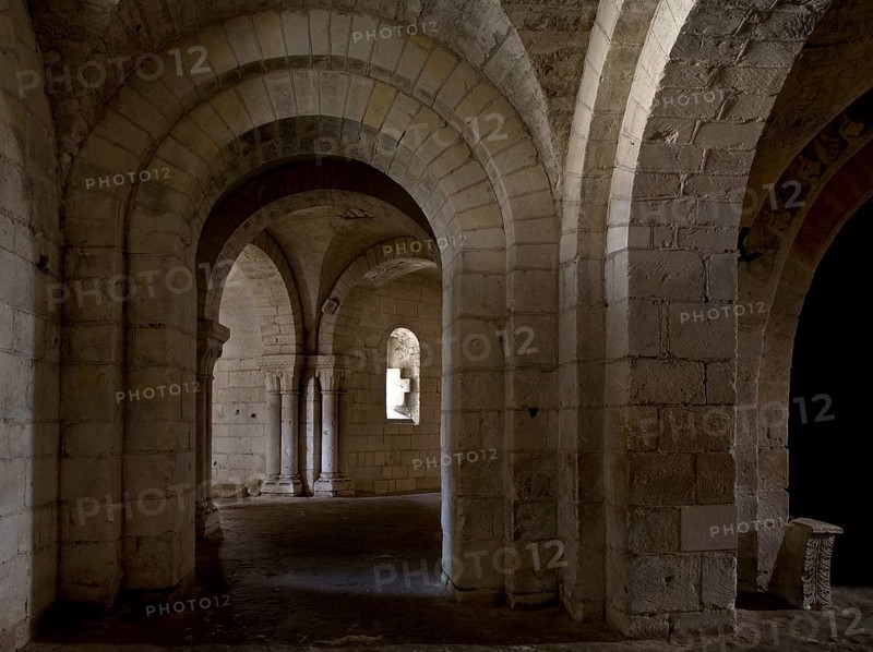 Saint-Aignan, collegiate church, crypt, portal to the ambulatory. The current Saint-Aignan church was built between the beginning of the 11th and the beginning of the 13th century on the site of a 9th century chapel. The chapel had received relics of St Anianus, Bishop of Orléans, and had become a much-visited pilgrimage site. The church originally had a foundation, St., Saint, Saint