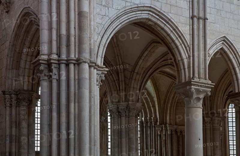 Vezelay, Basilica of Ste-Marie-Madeleine. Interior. Northeastern crossing pillar section at the back of the northern choir aisle, St., Saint, Saint