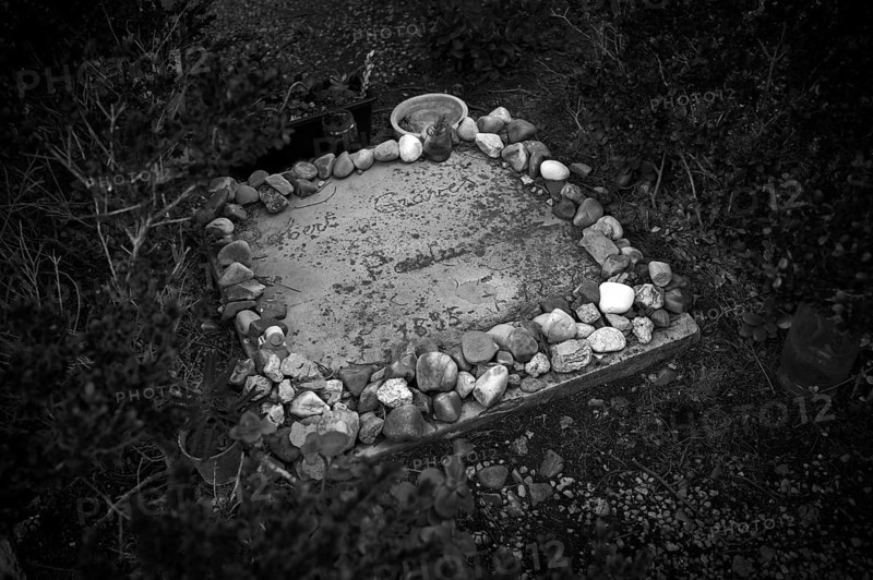 Grave, tombstone of the British poet and author Robert Graves, cemetery of the parish church Iglesia San Juan Bautista, artist village Deià, Tramuntana Mountains, Serra de Tramuntana, black and white, Majorca, Balearic Islands, Balearic Islands, Spain, Europe
