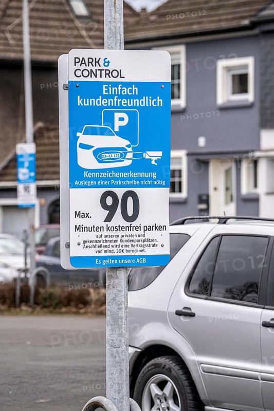 Customer car park of a supermarket, the car park is operated by the company Park&Control, the number plates of the vehicles are registered digitally by camera, 90 minutes are free of charge, those who park longer must pay a contractual penalty of 30€, Duisburg North Rhine-Westphalia, Germany, Europe