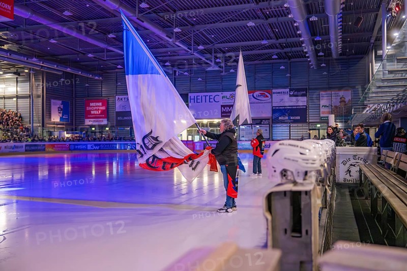 Large flags are waved on an illuminated ice rink during an event, Heilbronner Falken Vs Bietigheimer Steelers, Heilbronn, Germany, Europe