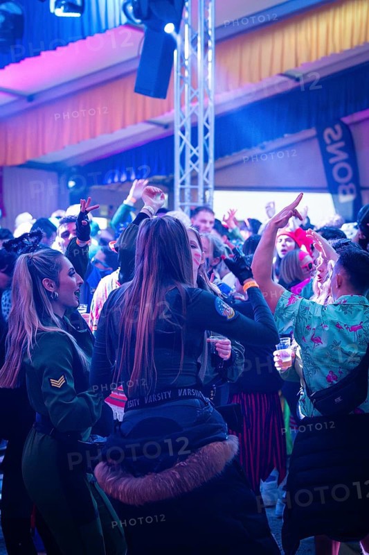 Dancing people enjoying a party with colourful lights in a tent, carnival, Schlagerkuchen Donzdorf, Göppingen district, Germany, Europe