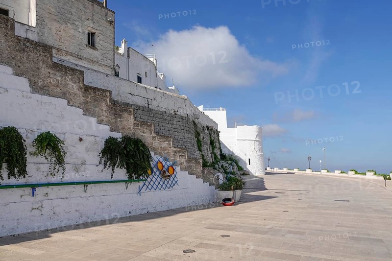 View of one of the towers of the Aragonese city wall in Viale Oronzo Quaranta, Ostuni, Apulia, Italy, Europe