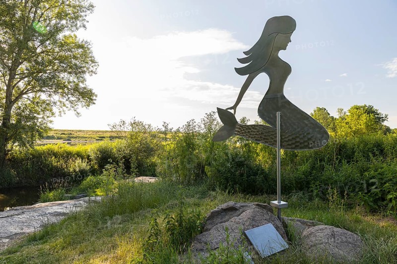 Figure of a mermaid and remains of the old mermaid stone in the dead Elbe estuary near Strehla, Saxony, Germany, Europe