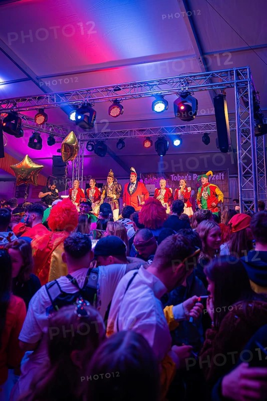 Colourful carnival concert with costumed performers on the illuminated stage, carnival, Schlagerkuchen Donzdorf, district of Göppingen, Germany, Europe