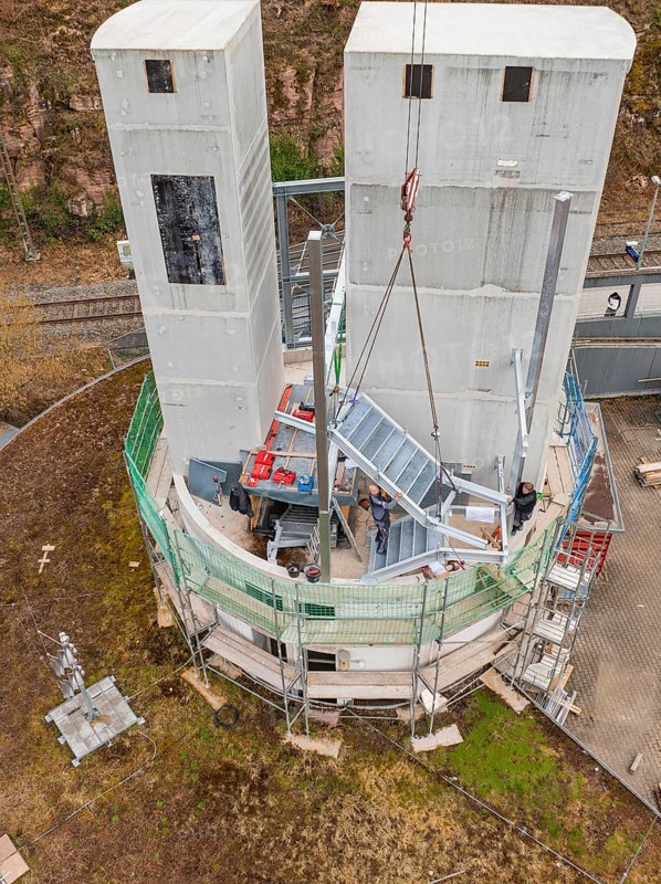 Close-up of a construction site with two large concrete towers and construction work, extension of the ZOB Calw tower on the new track of the Hermann Hesse railway, Calw, Black Forest, Germany, Europe