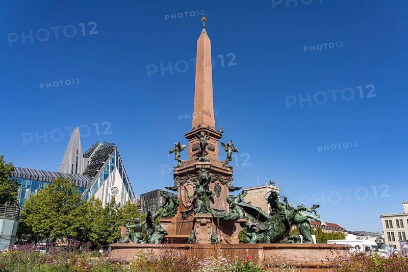 The Mende Fountain and the modern Augusteum of the University of Leipzig on Augustusplatz, Leipzig, Saxony, Germany, Europe
