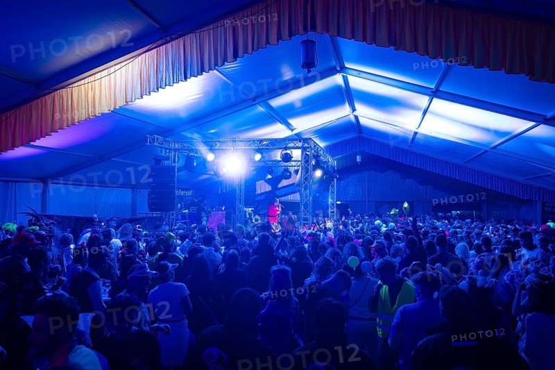 Large crowd at a night-time concert with blue stage lighting, carnival, Schlagerkuchen Donzdorf, Göppingen district, Germany, Europe