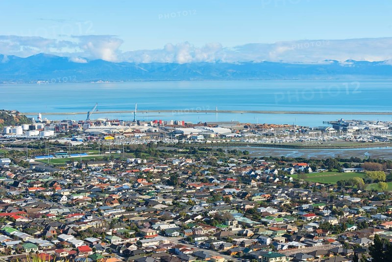 View of Nelson town and Mount Arthur mountain range in the distance, Nelson, Nelson Region, South Island, New Zealand, Oceania