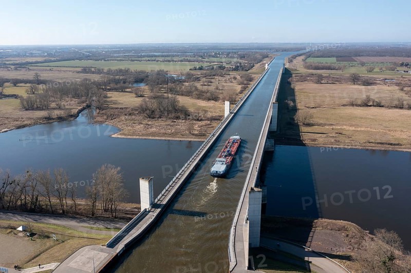 Barge at Magdeburg waterway junction, Mittelland Canal crosses Elbe in trough bridge, longest canal bridge in Europe, aerial view, Hohenwarthe, Saxony-Anhalt, Germany, Europe