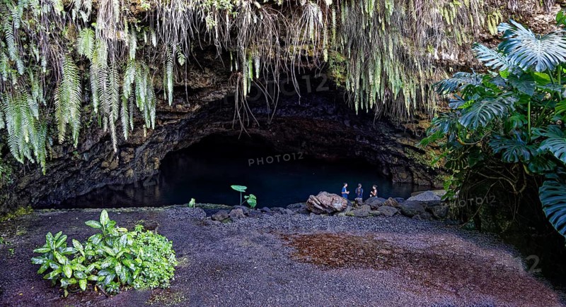 Grotto, filled with water, plants, different, various, three tourists, Grottes De Mara'a, Paea, Tahiti-Nui, Tahiti, Society Islands, Leeward Islands, French Polynesia, Oceania