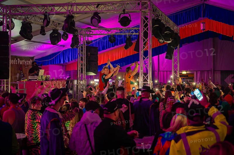 Zipfelbuben, people celebrating at a concert in a decorated tent with colourful lights, carnival, Schlagerkuchen Donzdorf, district of Göppingen, Germany, Europe