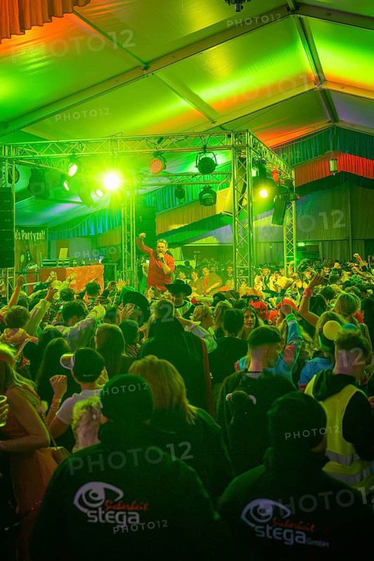 Concert atmosphere with green lights and an energetic audience in front of the stage, carnival, Schlagerkuchen Donzdorf, district of Göppingen, Germany, Europe
