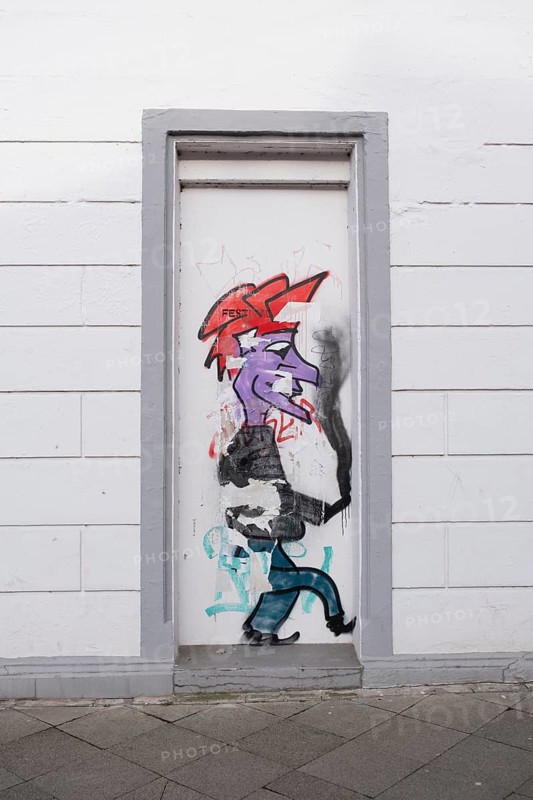 Graffiti on a disused entrance door, street photography, Linden-Limmer, Hanover, Lower Saxony, Germany, Europe