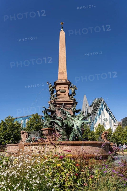 The Mende Fountain and the modern Augusteum of the University of Leipzig on Augustusplatz, Leipzig, Saxony, Germany, Europe