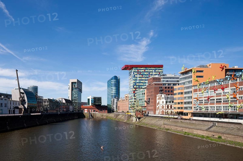 Western part, view from the pedestrian bridge, on the right Colorium and Roggendorf House with the Flossis by the artist rosalie