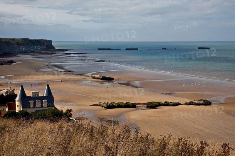 Channel coast with relics of the allied MULBERRY landing party on the sixth of June 1944, so-called D-Day