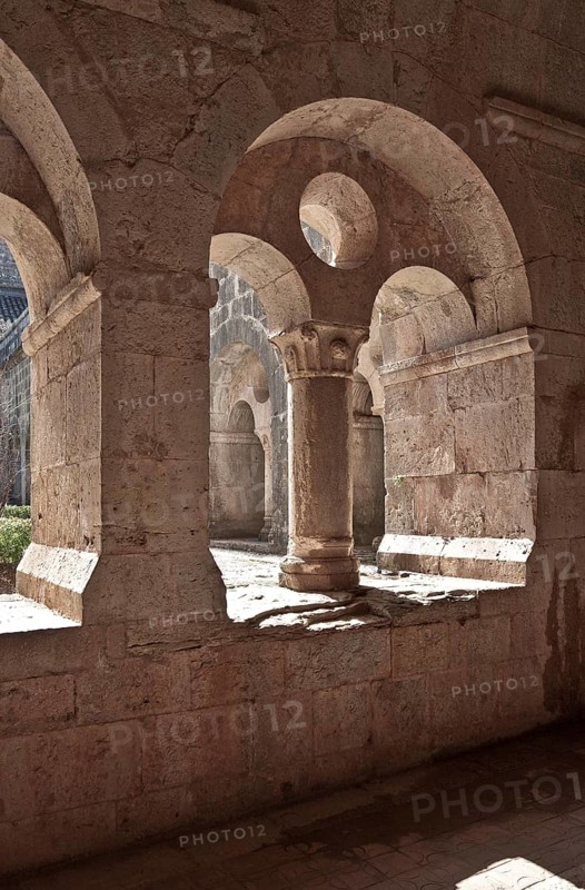Cistercian monastery founded in 1146, cloister north wing biforium with view through to the west wing