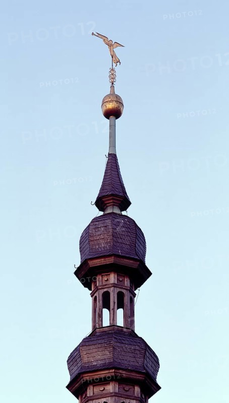 Schweinfurt, St Salvator. Trumpet blowing angel as weather vane on the baroque spire, St., Sankt, Saint