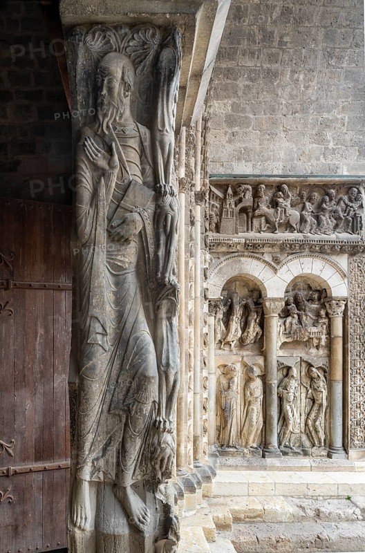 Moissac, Saint-Pierre Abbey, portal of the abbey church, trumeau pillar with St Paul the Apostle, behind it the right-hand vestment reliefs