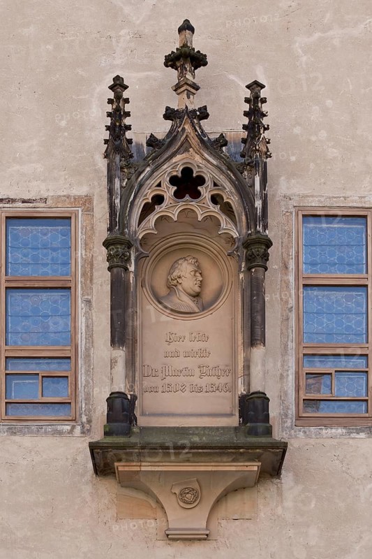 Tracery canopy on the outside between the windows of the Luther Room, containing a medallion with a portrait relief of Martin Luther, 1876 by Emil Schober