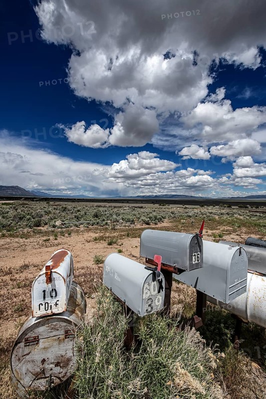 Letterboxes, mailboxes, cumulus clouds Highway 50, Loneliest Road in America, Ely, Nevada, USA, North America