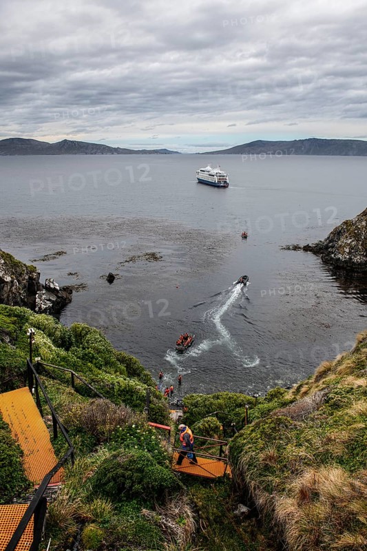 Visitors land on Cape Horn, Cabo de Hornos National Park, southernmost point of South America, Hornos Island, Tierra del Fuego, Chile, South America