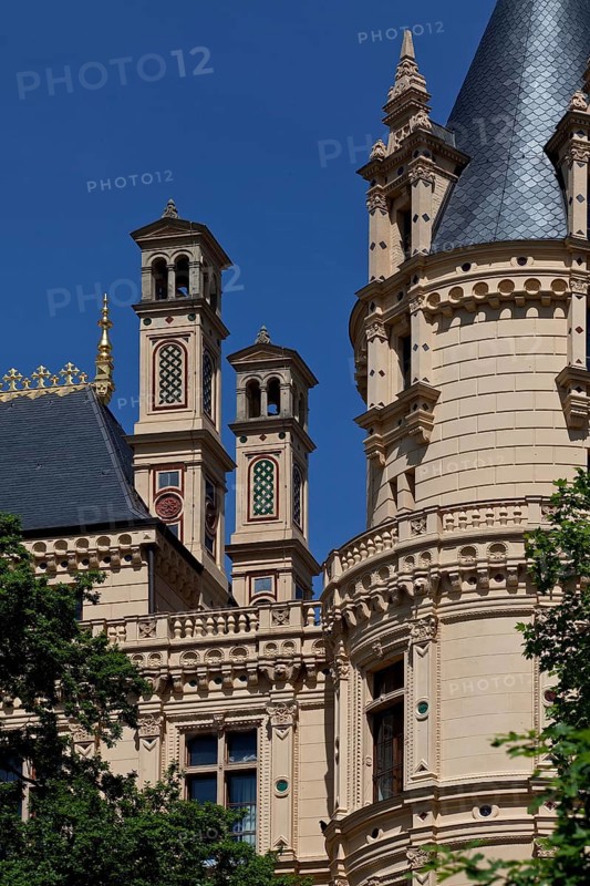 Decorative chimneys on the roof of the south wing and partial view of the south-east tower