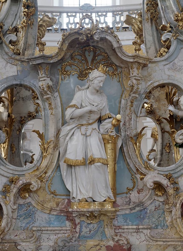 The three Madl. Barbara at the altar of grace. The Vierzehnheiligen Basilica near Bad Staffelstein in the district of Lichtenfels is a pilgrimage church in Upper Franconia. The church, built according to plans by Balthasar Neumann, is dedicated to the Fourteen Holy Helpers and receives around half a million visitors a year