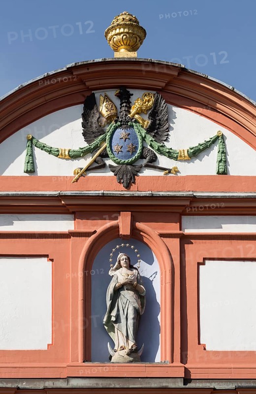 Prelature courtyard, crescent moon Madonna above the portal of the prelature